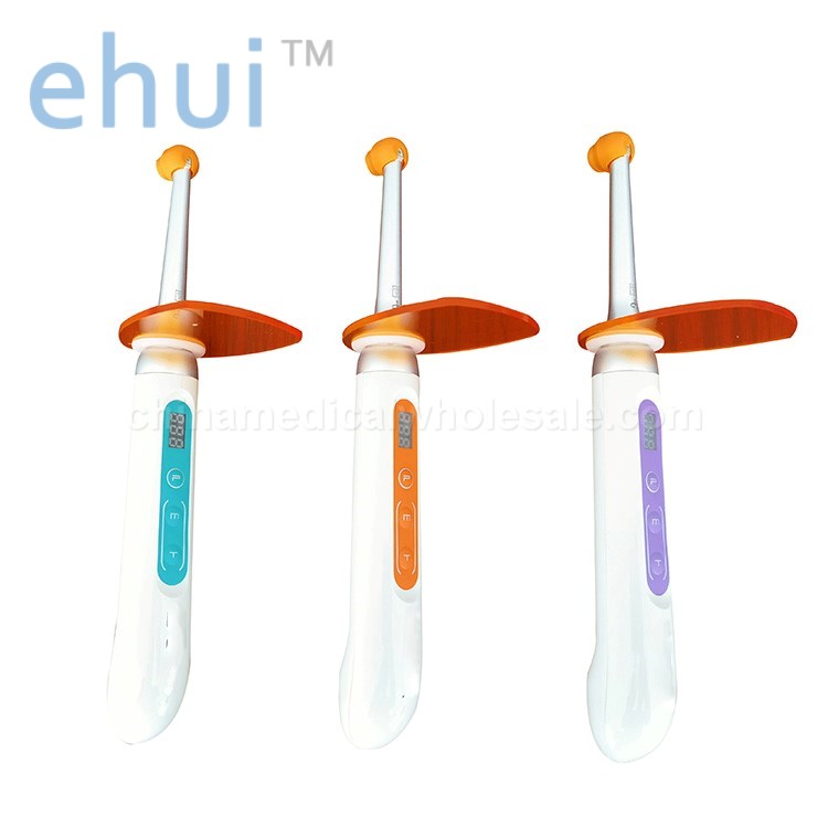 Dental light curing lamp with three intensity composite modes