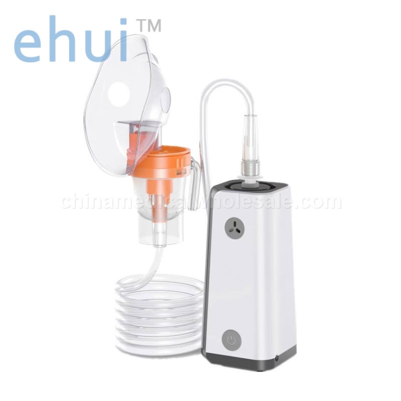 Portable inhaler with charger compressor atomizer